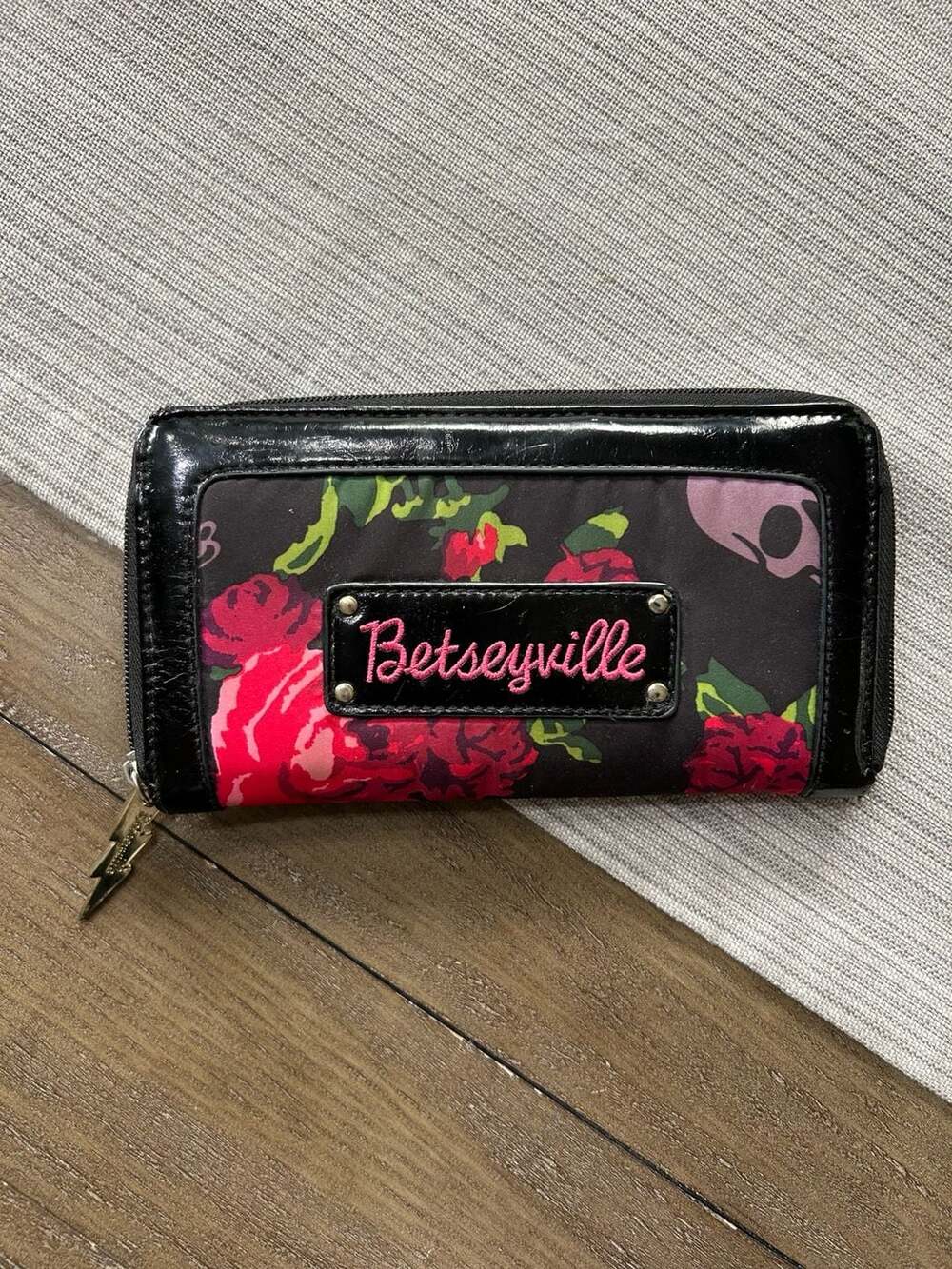 Betseyville by Betsey Johnson Zip Around Wallet with Skull and Floral Print